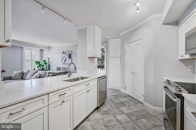 kitchen with ornamental molding, a sink, white cabinetry, appliances with stainless steel finishes, and light countertops