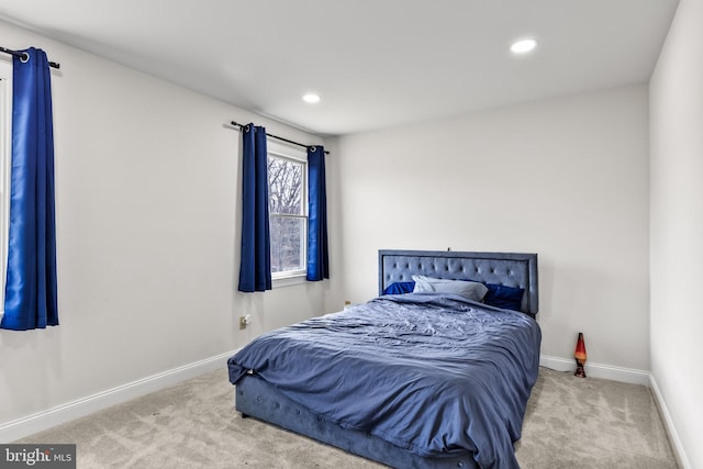 bedroom with recessed lighting, baseboards, and carpet floors