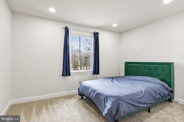 bedroom featuring recessed lighting, baseboards, and carpet floors