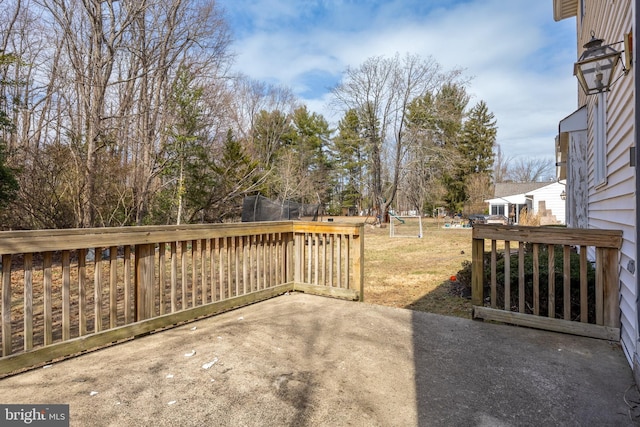 view of patio / terrace with a playground and a trampoline