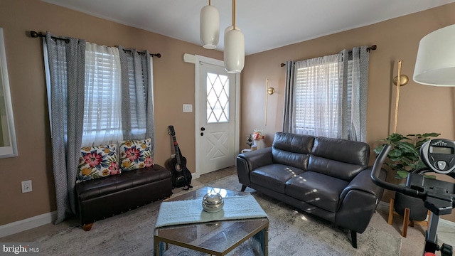 living room featuring baseboards