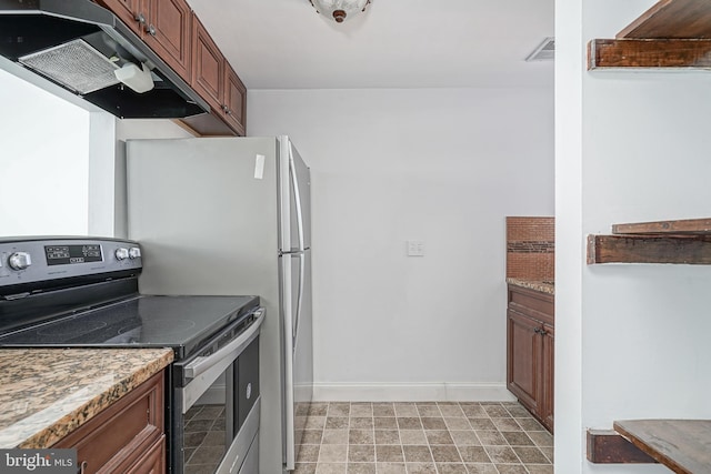 kitchen featuring under cabinet range hood, baseboards, and electric stove