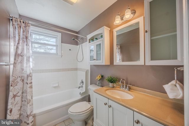 full bath with vanity, toilet, and shower / bath combo