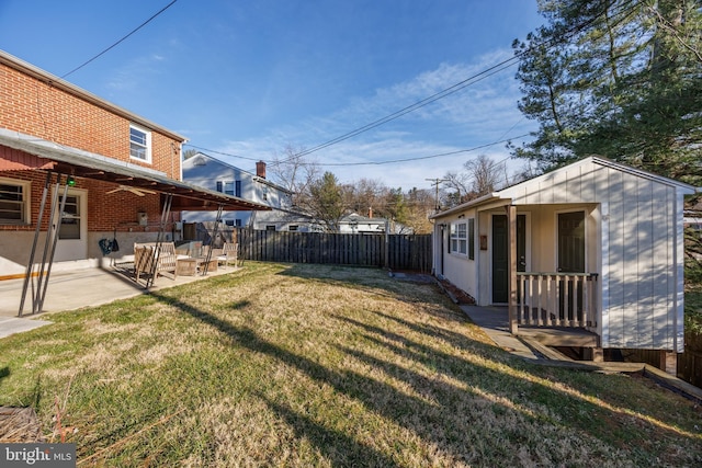 view of yard featuring a patio and a fenced backyard