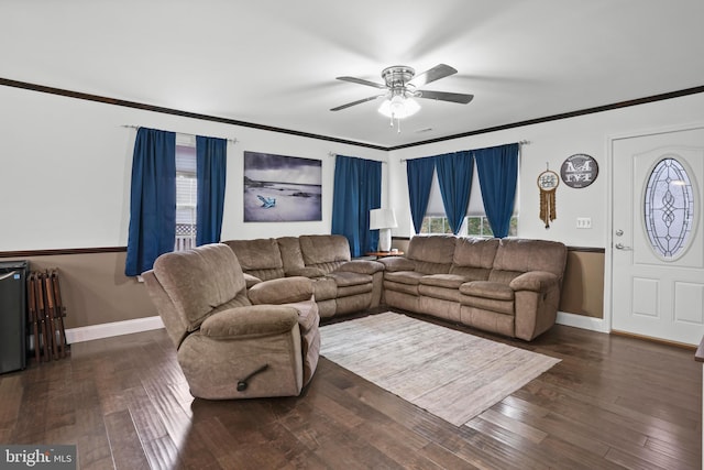 living area with ceiling fan, crown molding, baseboards, and hardwood / wood-style floors