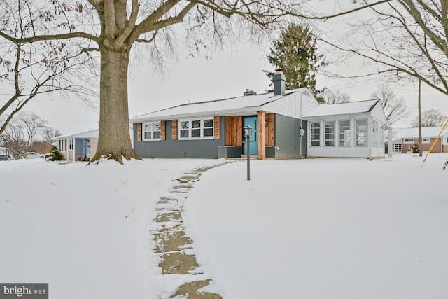 view of front of house with a chimney