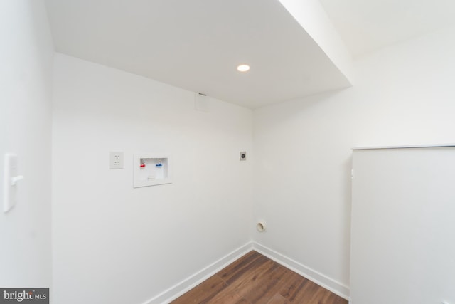 laundry area with baseboards, laundry area, hookup for a washing machine, dark wood-style floors, and electric dryer hookup