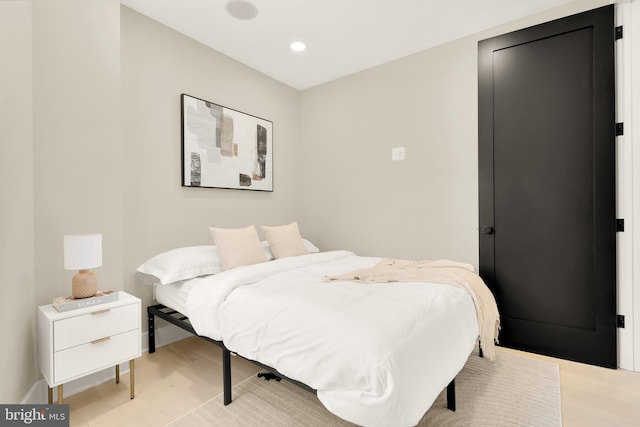 bedroom featuring recessed lighting and light wood-type flooring