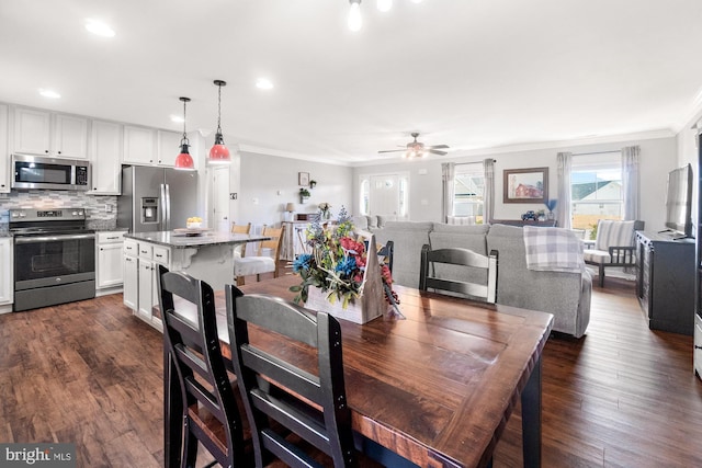 dining area with ceiling fan, recessed lighting, ornamental molding, and dark wood-style flooring