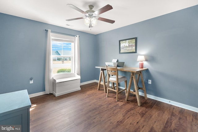 home office featuring visible vents, baseboards, and wood finished floors