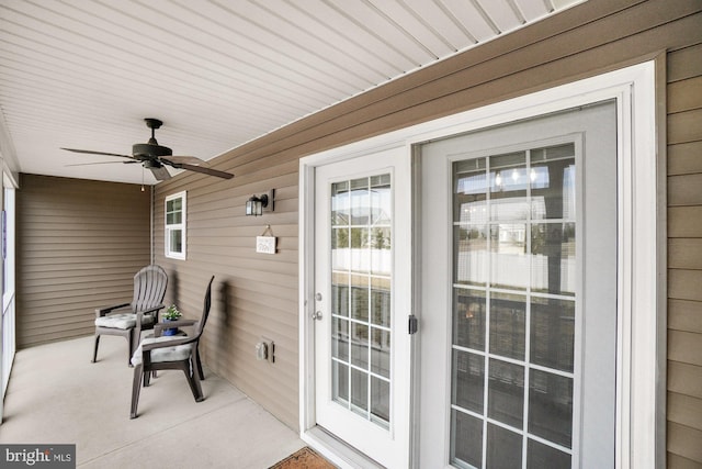 exterior space featuring a porch and ceiling fan