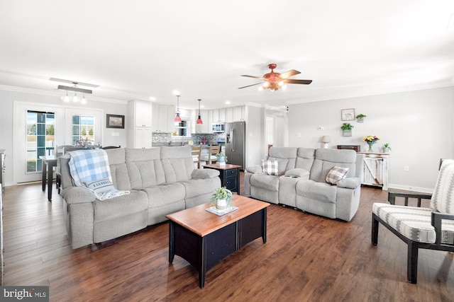 living area with dark wood-style floors, recessed lighting, crown molding, baseboards, and ceiling fan