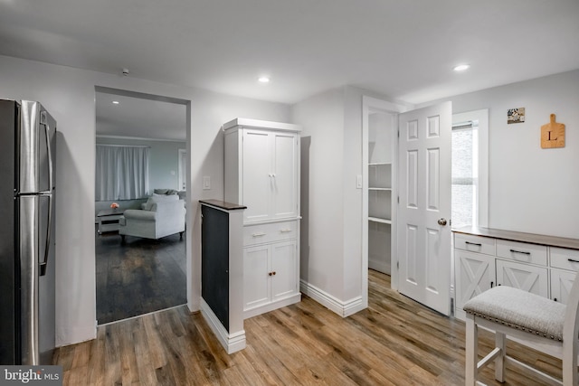 walk in closet featuring light wood-style floors