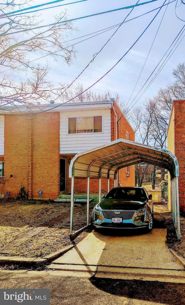 view of car parking featuring a carport