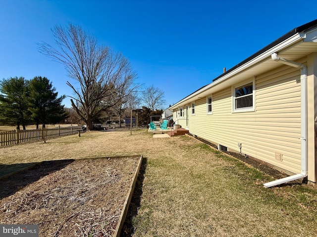 view of yard featuring fence