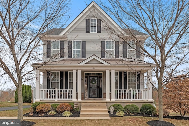 view of front of home featuring covered porch