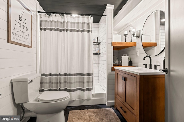 full bathroom with shower / bath combo with shower curtain, toilet, and vanity