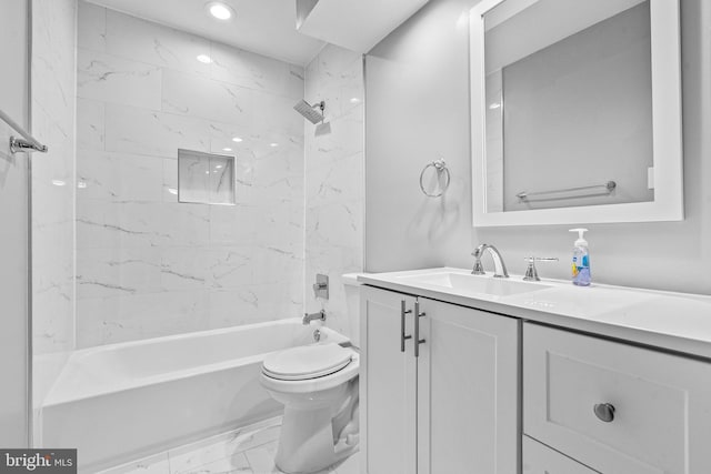 bathroom with toilet, marble finish floor, recessed lighting,  shower combination, and vanity