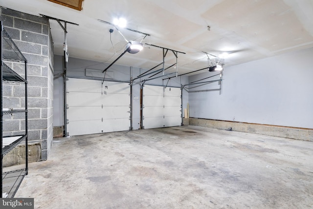 garage featuring a garage door opener