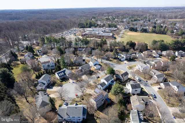 aerial view with a residential view and a forest view