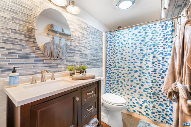 2225 Tanners Rdg, Condos, Wintergreen Resort, VA 22967 - bathroom featuring tasteful backsplash, vanity, tile walls, toilet, and a shower with curtain