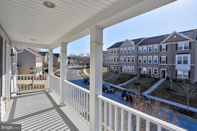 balcony featuring a residential view