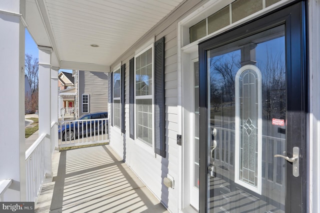 balcony featuring a porch