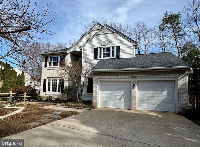 traditional home featuring brick siding, fence, concrete driveway, roof with shingles, and a garage