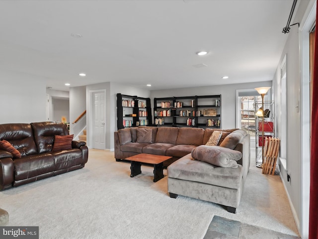 living area with stairs, recessed lighting, baseboards, and carpet floors