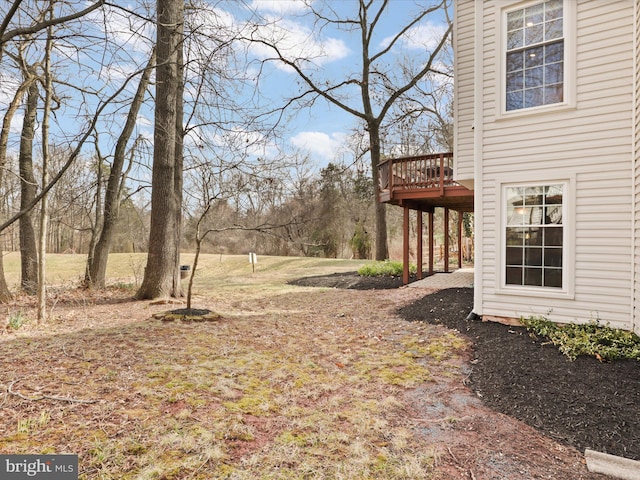 view of yard featuring a deck