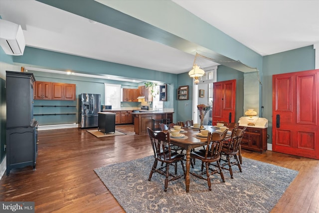 dining room with dark wood finished floors and a wall mounted air conditioner