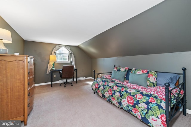 carpeted bedroom featuring baseboard heating, baseboards, and vaulted ceiling