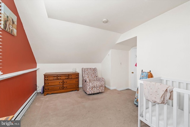 bedroom featuring a crib, carpet, lofted ceiling, and a baseboard radiator