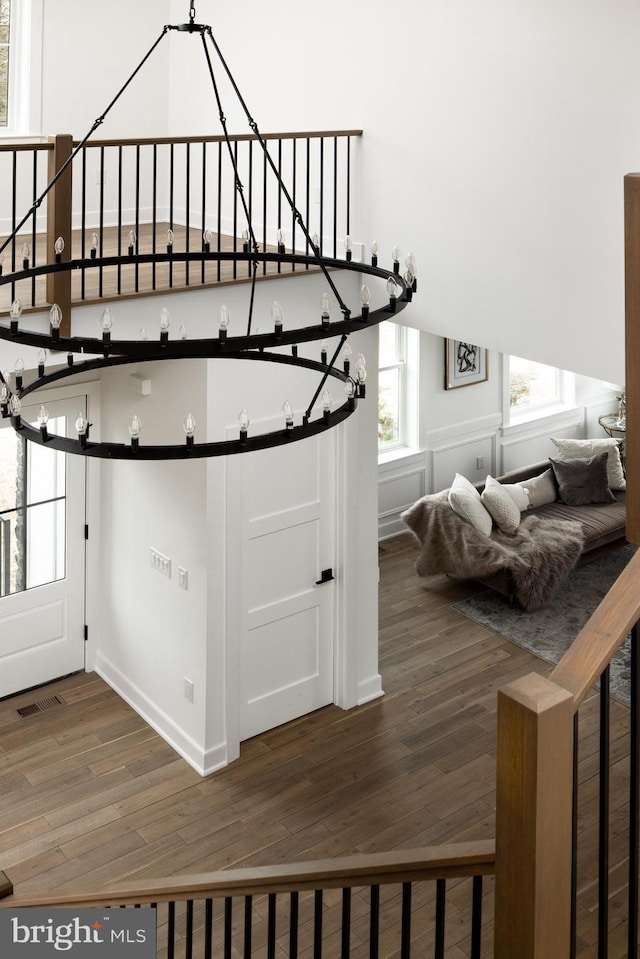 interior space featuring visible vents and wood finished floors