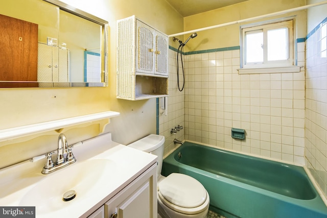 full bath with shower / bathing tub combination, toilet, and vanity