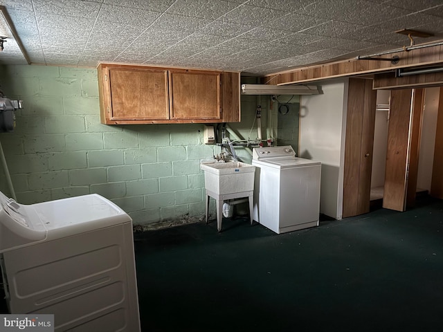 washroom featuring a sink and cabinet space