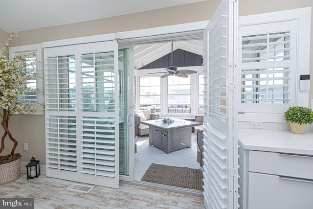 bathroom with a ceiling fan