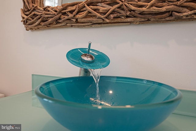 interior details with a sink and a freestanding tub