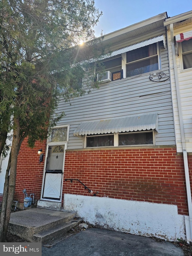 view of front of home with brick siding