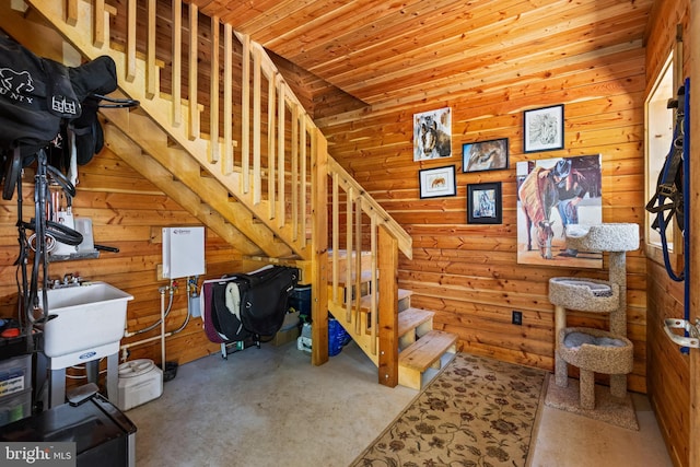 staircase with wooden ceiling