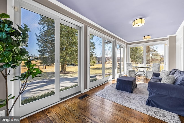 sunroom / solarium with visible vents