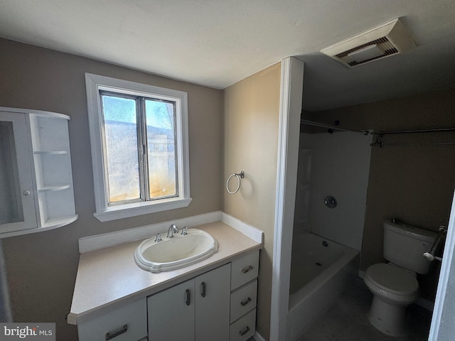 bathroom with visible vents, toilet, vanity, and shower / tub combination