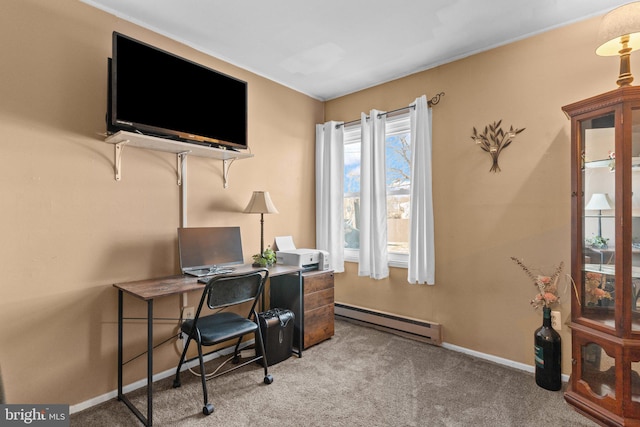 carpeted office space featuring a baseboard heating unit and baseboards