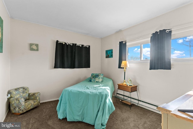 bedroom featuring carpet, baseboards, and baseboard heating