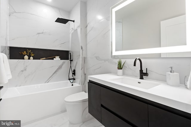 full bath featuring toilet, vanity, shower / bathing tub combination, marble finish floor, and tile walls