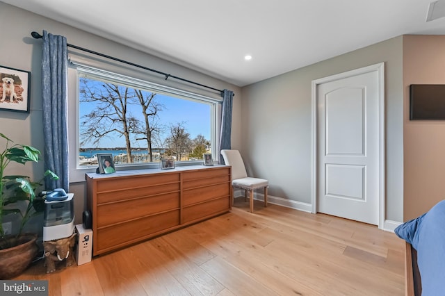 bedroom featuring recessed lighting, baseboards, and light wood finished floors