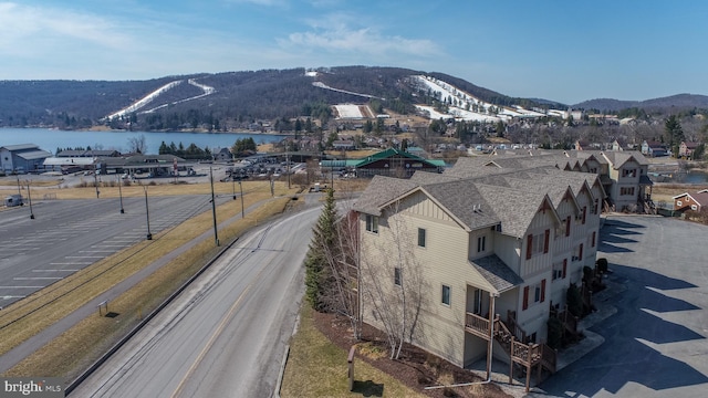 mountain view featuring a water view