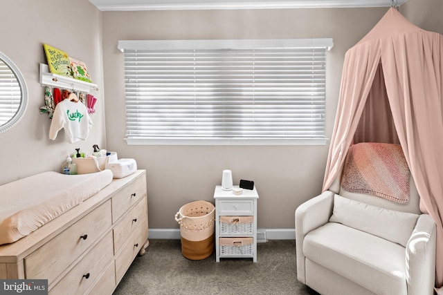 bedroom featuring carpet flooring and baseboards