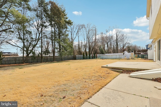 view of yard with a patio and fence