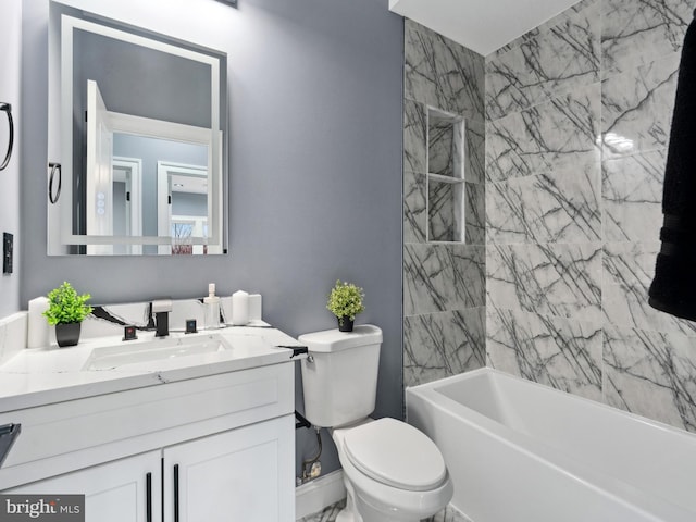 bathroom with vanity,  shower combination, and toilet